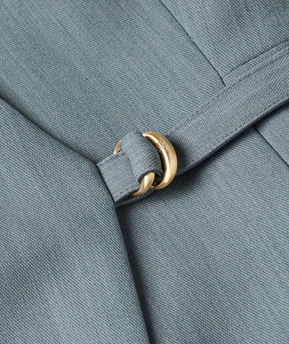Image 38: Close-up van een overslagjurk in de kleur Sky Blue Melange