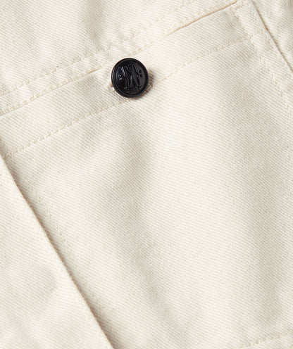 Image 33: Close-up van een oversized gilet in de kleur Ecru