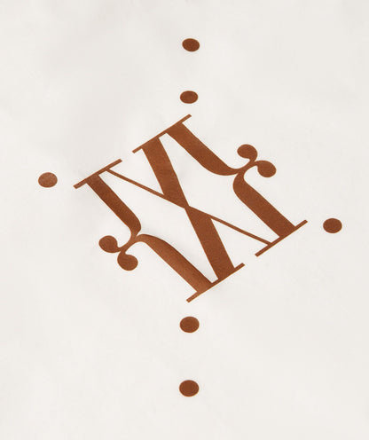 Image 24: Close-up van een pareo met logo in de kleur Brown Ecru